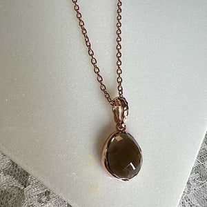 Riva - wavy edge kettinghanger rookkwarts rosé verguld goud