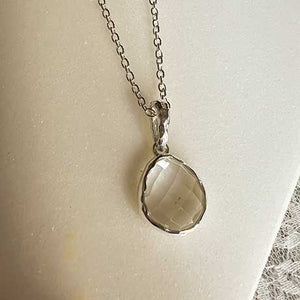 Riva - wavy edge rose gold pendant clear quartz gemstone